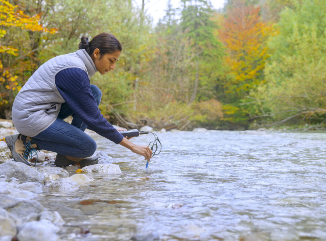 Biologist measures water in Slovenia